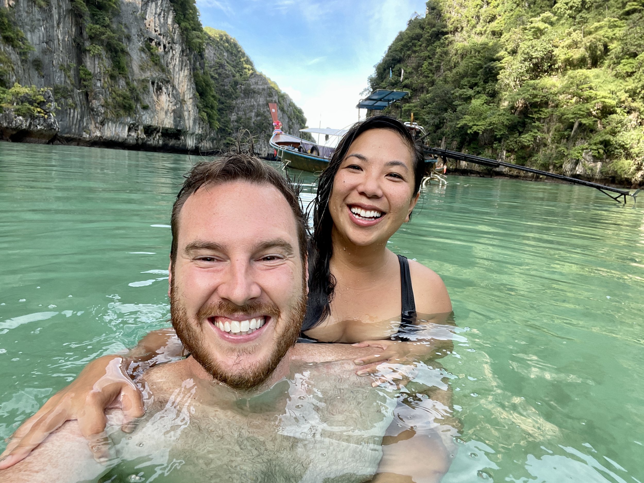 Lisa and Josh swimming in turquoise water